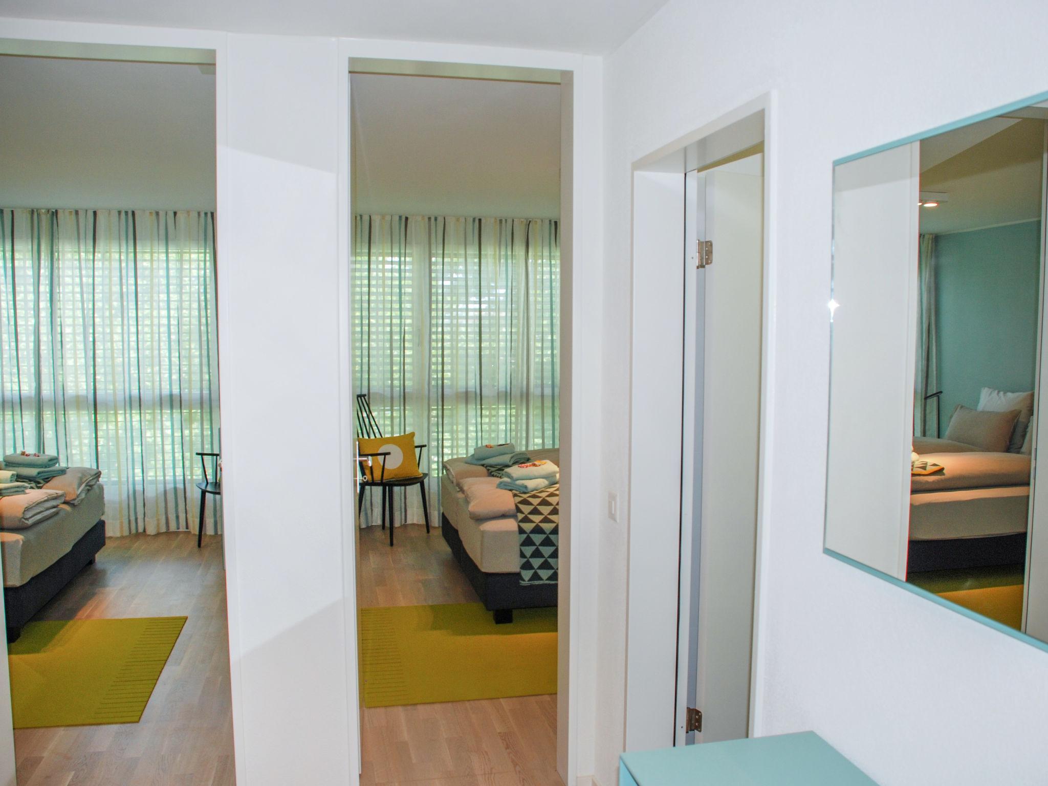 Foto 8 - Appartamento con 2 camere da letto a Locarno con vista sulle montagne