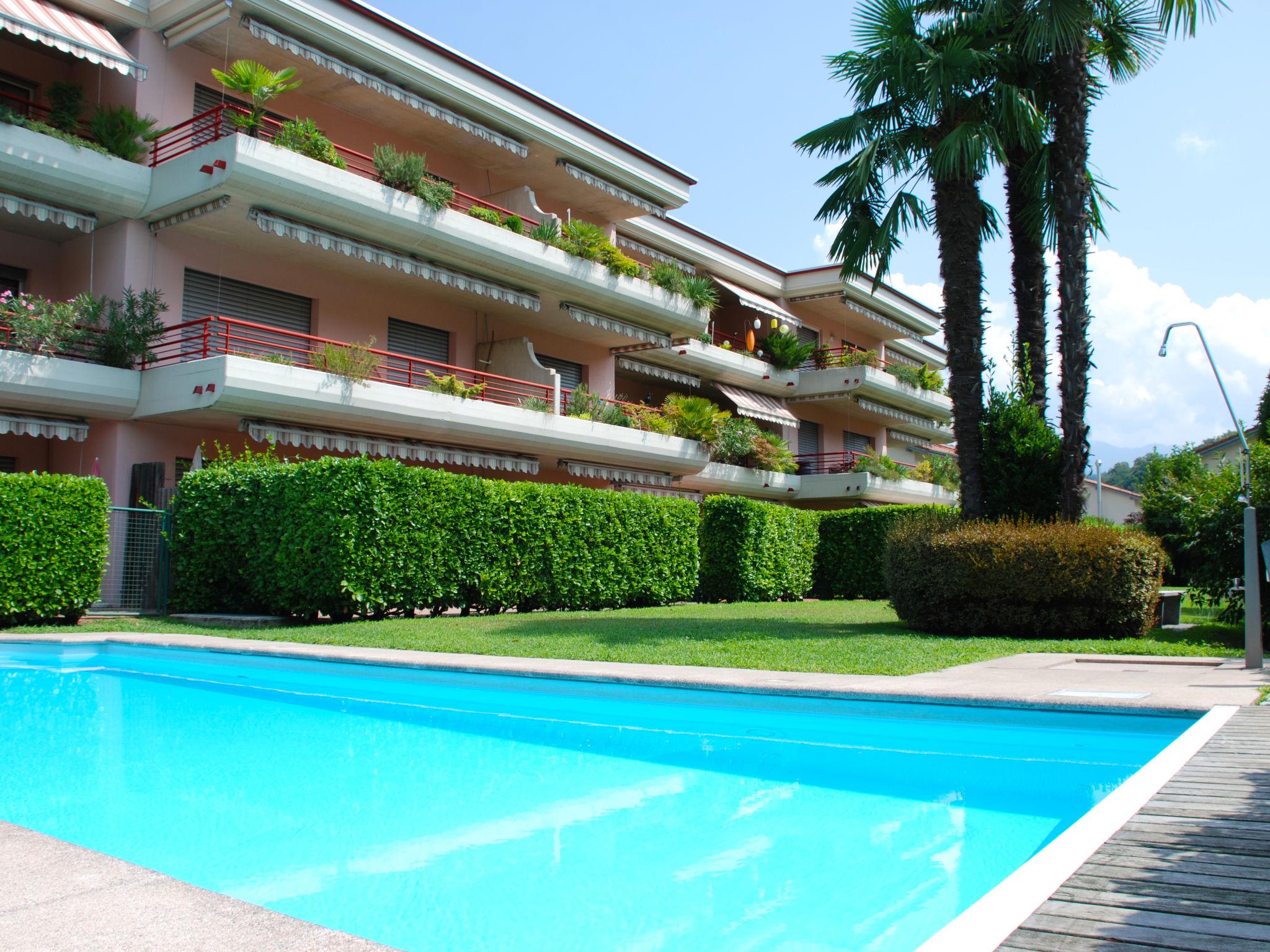 Photo 1 - Appartement de 1 chambre à Caslano avec piscine et vues sur la montagne