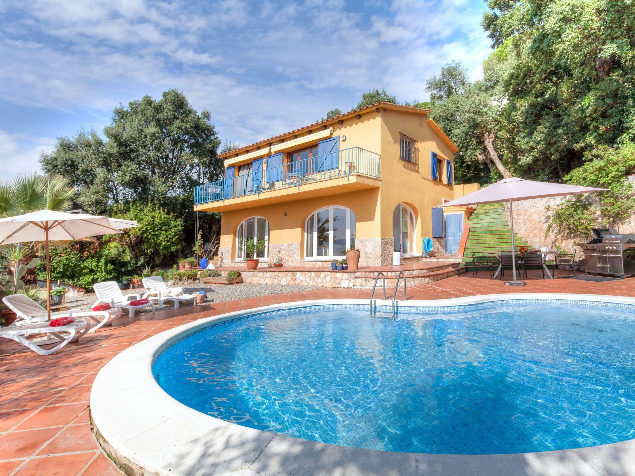 Photo 2 - Maison de 2 chambres à Santa Cristina d'Aro avec piscine privée et vues à la mer