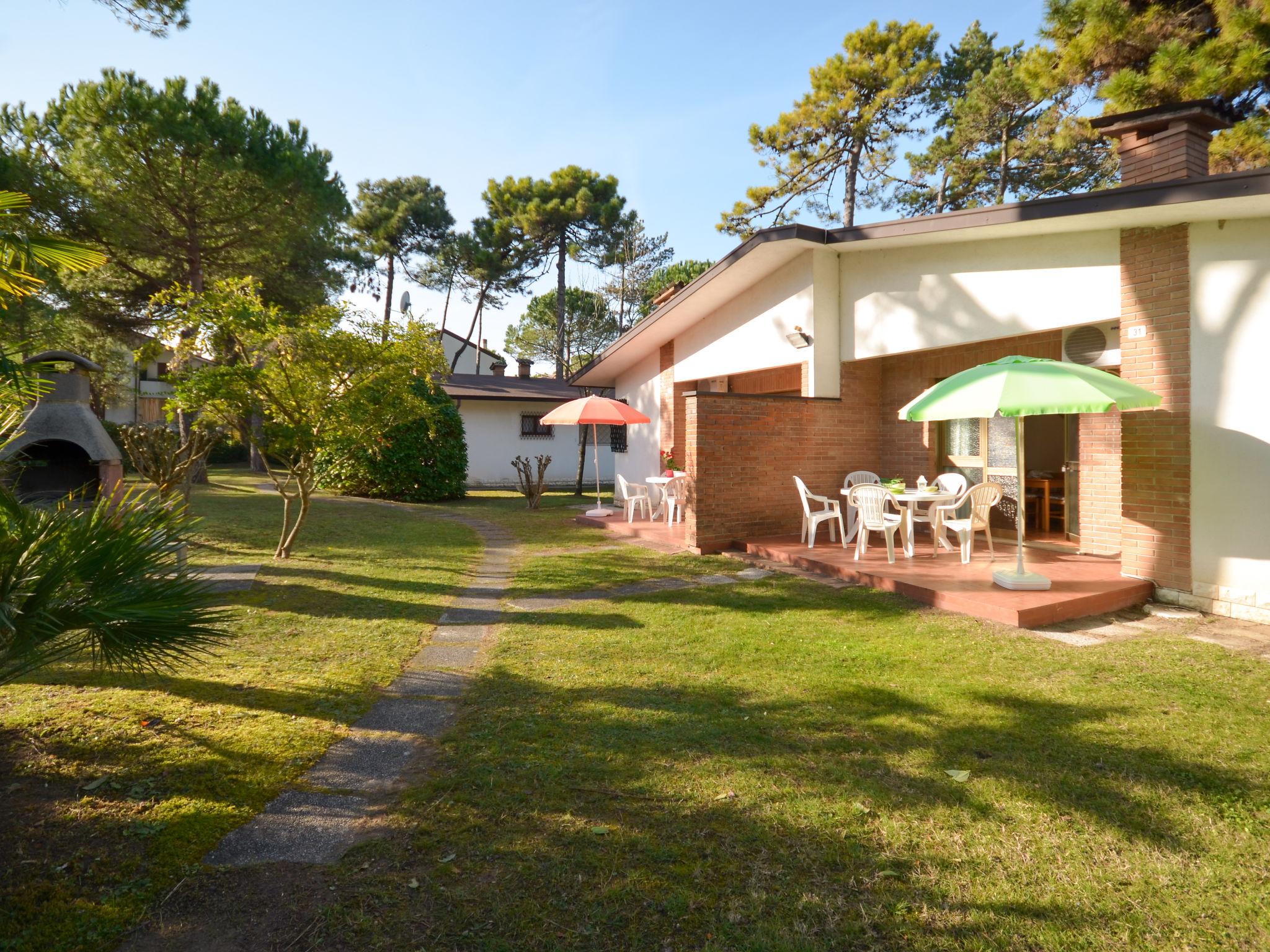 Foto 14 - Casa con 2 camere da letto a Lignano Sabbiadoro con giardino e vista mare