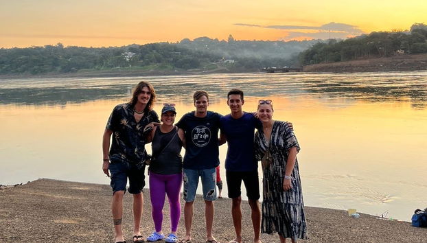 Group photo on the shore of the River Paraná