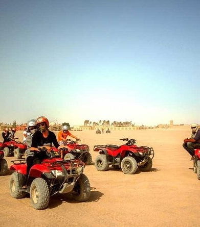 Foto - Tour in quad nel deserto, giro in cammello e cena beduina