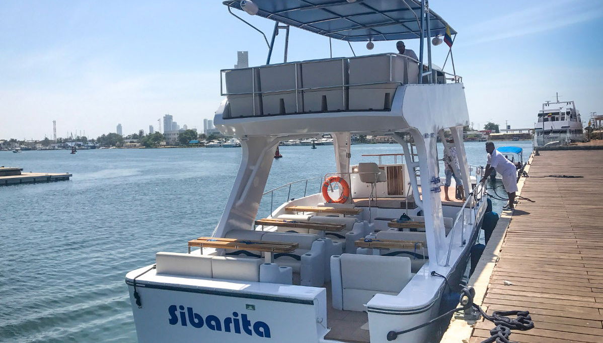 Passeio de barco ao entardecer - Foto 1