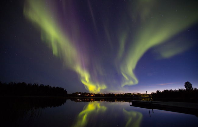 Passeio de moto de neve sob a aurora boreal - Foto 1