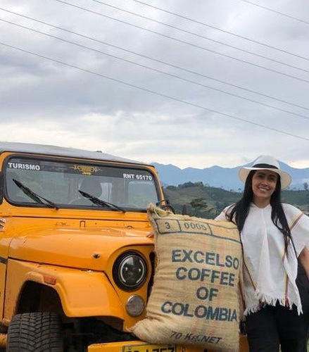 Foto de Tour del café por Jardín