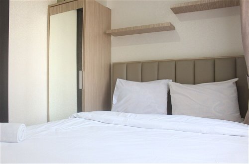 Foto 3 - Simple And Homey 2Br Apartment At Grand Asia Afrika