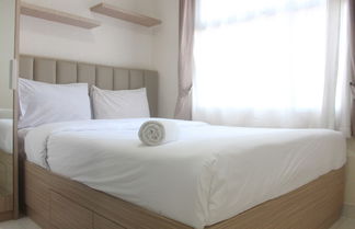 Photo 1 - Simple And Homey 2Br Apartment At Grand Asia Afrika