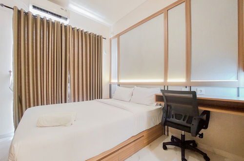 Photo 1 - Warm And Nice Studio Room Sky House Bsd Apartment