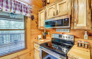 Photo 3 - Sevierville Cabin w/ Wraparound Deck + Lake Access