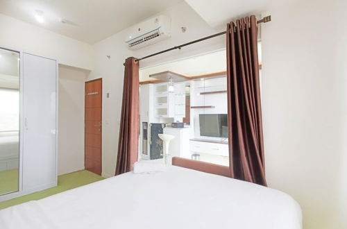 Photo 2 - Comfort 1Br At Vida View Makassar Apartment