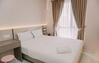 Foto 1 - Cozy And Restful Studio Sky House Alam Sutera Apartment