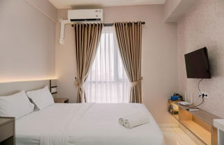 Photo 3 - Cozy And Restful Studio Sky House Alam Sutera Apartment