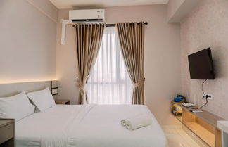 Foto 3 - Cozy And Restful Studio Sky House Alam Sutera Apartment