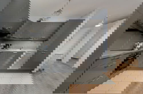 Photo 12 - Modern Apartment With Balcony by Renters