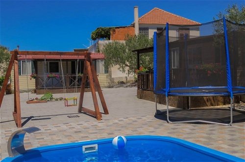 Foto 15 - Captivating Holiday Home in Pakostane With Swimming Pool