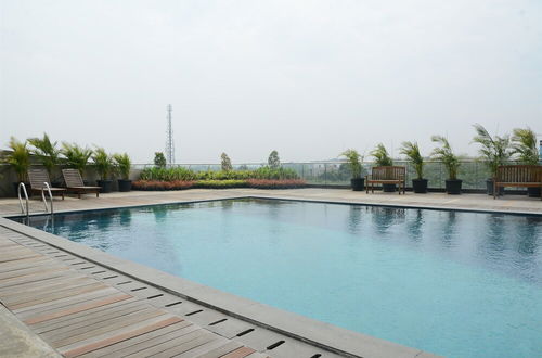 Photo 12 - Nice And Stylish 1Br At Tree Park City Bsd Apartment