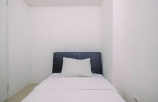 Photo 2 - Comfort 2Br With City View Bassura City Apartment