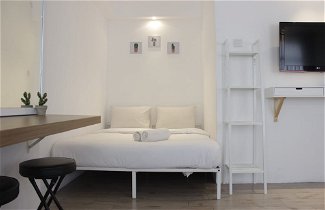 Photo 2 - Modern Chic Studio Room at Grand Asia Afrika Apartment