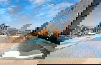 Photo 2 - New Austin High Rise w/ Luxe Amenities Rooftop Pool, Gym, Yoga Studio & More!