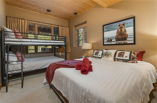 Photo 2 - Luxury Log Chalet | Pool + Private HotTub | Ski In/Out | Overlooking Greywolf GC