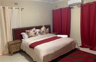 Photo 2 - Executive 3 Bedrooms Fully Furnished Apartment Close to Amenities
