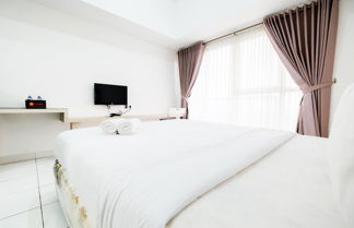 Photo 2 - Cozy Studio Casa De Parco near The Breeze BSD City