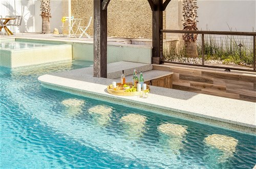 Photo 32 - Monarch by Avantstay Stunning Estate 1 Block to Beach, Swim Up Bar, Hot Tub, & Rooftop Views
