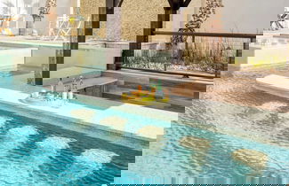 Photo 3 - Monarch by Avantstay Stunning Estate 1 Block to Beach, Swim Up Bar, Hot Tub, & Rooftop Views