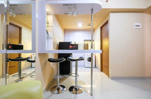 Photo 11 - Bright and Stylish 1BR The Oasis Apartment Cikarang