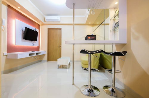 Foto 26 - Bright and Stylish 1BR The Oasis Apartment Cikarang