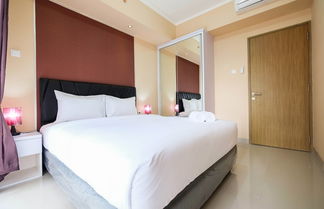 Photo 3 - Bright and Stylish 1BR The Oasis Apartment Cikarang