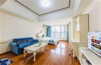 Foto 2 - Home Inn Huayi Apartment
