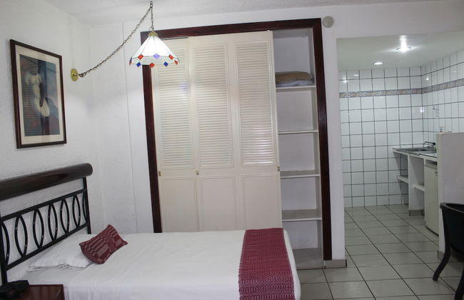 Novo Hotel & Suite - Photo 12