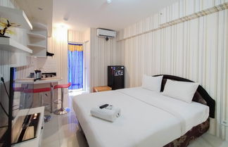 Photo 2 - Nice And Cozy Studio At Bassura City Apartment