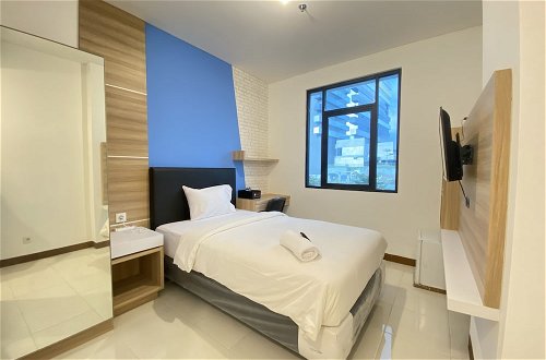 Foto 3 - Simply Studio Room Semi Apartment at The Lodge Paskal near BINUS University