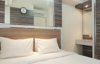 Photo 2 - Cozy Stay 2Br Green Bay Pluit Apartment