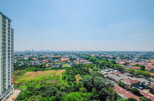 Photo 16 - Cozy and Simple Living Studio Apartment at Cinere Resort