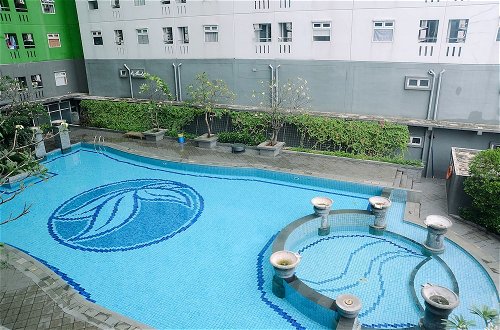 Photo 15 - Tidy 2BR with Modern Design Green Pramuka City Apartment