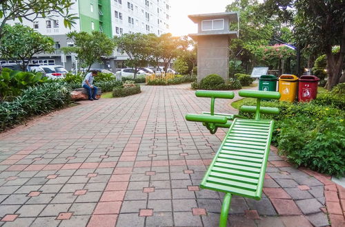 Photo 27 - Homey 1BR with Spacious Living Room and Sofa Bed Green Pramuka Apartment