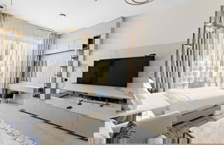 Foto 2 - Cosy Studio Apartment With Pool gym Game Room