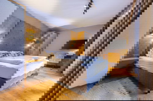 Foto 1 - Spacious Apartment With Swimming Pool