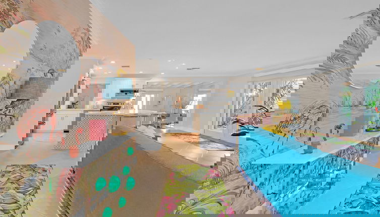Photo 1 - Flirty Flamingo Colorful Waterfront Escape w Pool