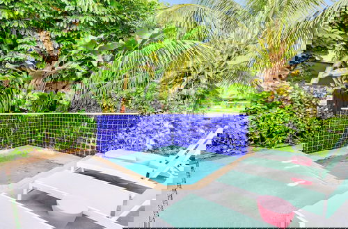 Foto 2 - Flirty Flamingo Colorful Waterfront Escape w Pool