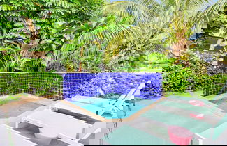 Foto 2 - Flirty Flamingo Colorful Waterfront Escape w Pool