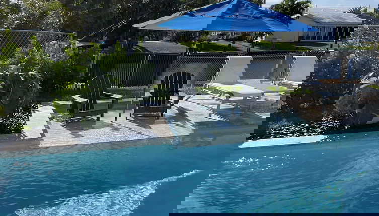 Photo 1 - Luxury Waterfront Home Minutes from the Beach by RedAwning