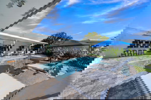Photo 20 - Luxury Waterfront Home Minutes from the Beach by RedAwning