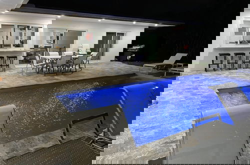Photo 28 - Luxury Waterfront Home Minutes from the Beach by RedAwning
