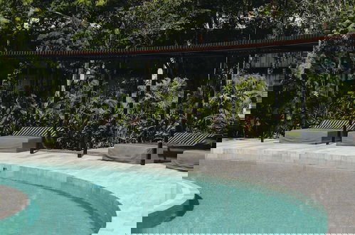 Foto 28 - Beautiful Jungle Loft With Rooftop Pool and Gym