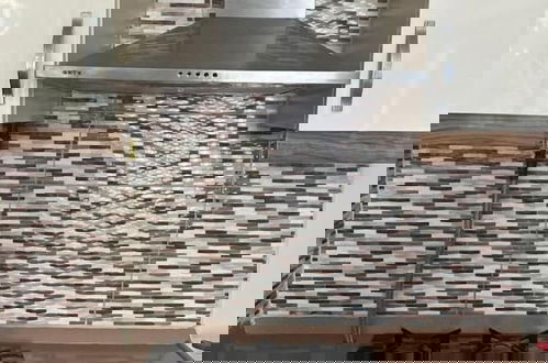 Foto 13 - Overland Residence