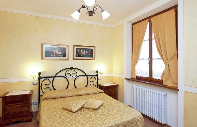 Tuscan Style Apartment with View of the Hills - Photo 6